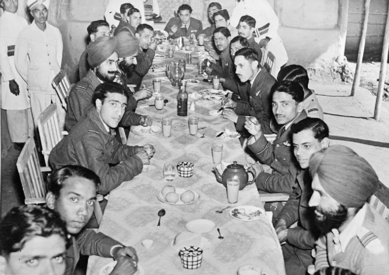 Officials of No. 1 Squadron having a meal together 