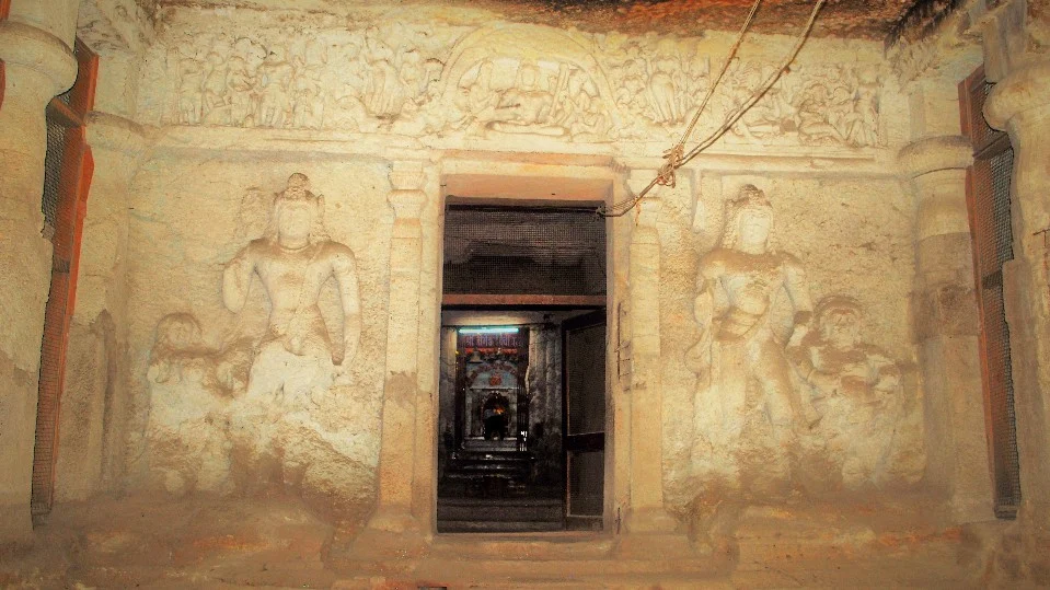 Sculptural reliefs of Shiva and Parvati inside the Jogeshwari Caves