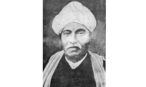 Krishna Arjun Keluskar, the Principal of Wilson High School