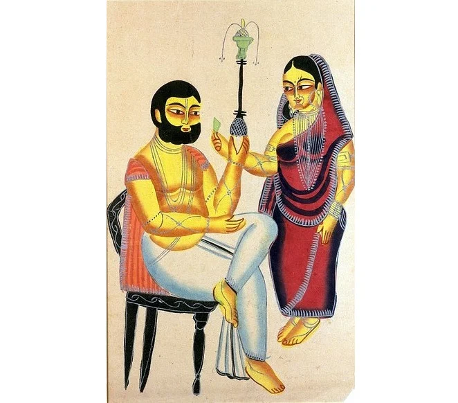 Elokeshi is offering betel leaf to the Mahant