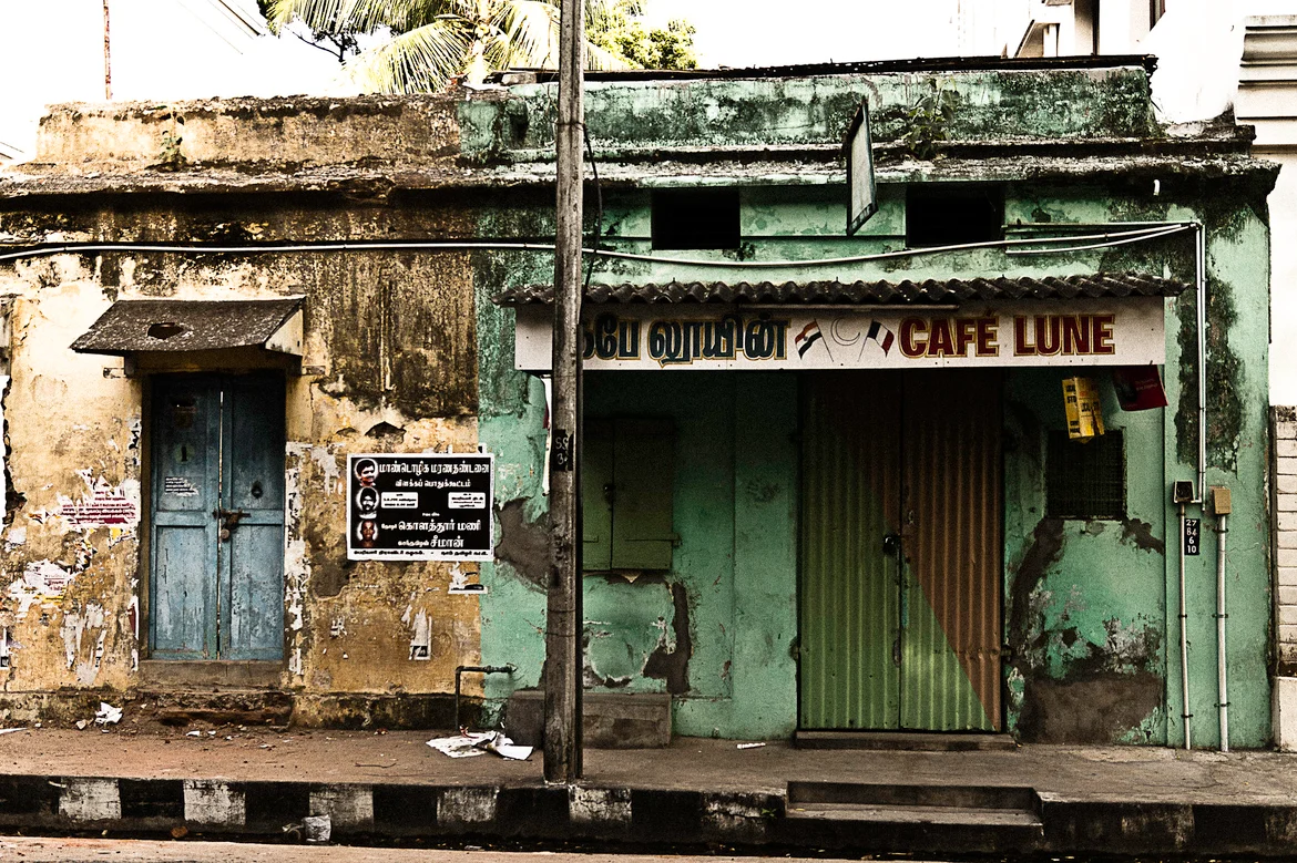 A closed Café Lune on Rue Suffren