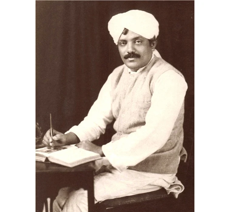 Meghani at his desk
