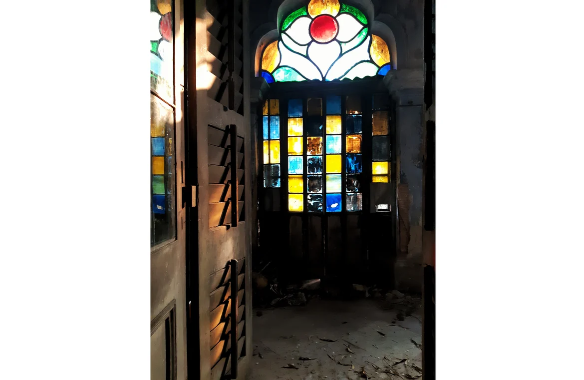 Uniquely-designed glass panels adorn some of the doors of Basu Bati