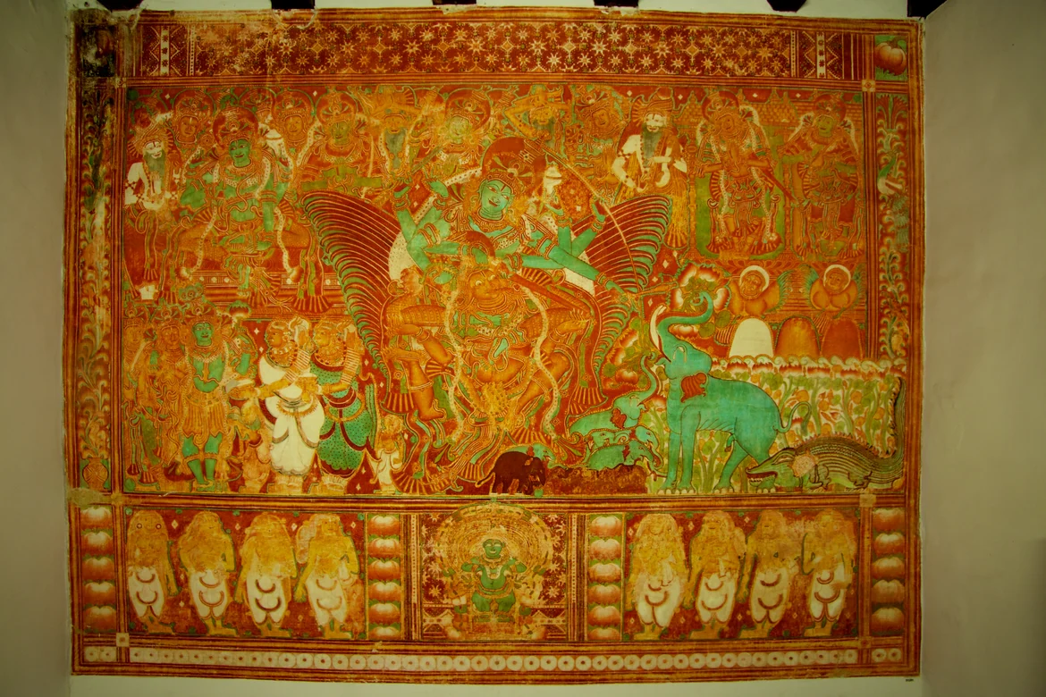 Mural depicting Gajendramoksham (an elephant saluting Lord Vishnu as the other gods, goddesses and sages look on in reverence) at the Krishnapuram Palace in Kayamkulam in Alappuzha district. This 154-sq ft painting is said to be the largest mural in Kerala. The Krishnapuram Palace was the residence of the rulers of the Kayamkulam Kingdom, whose chief deity is Vishnu.