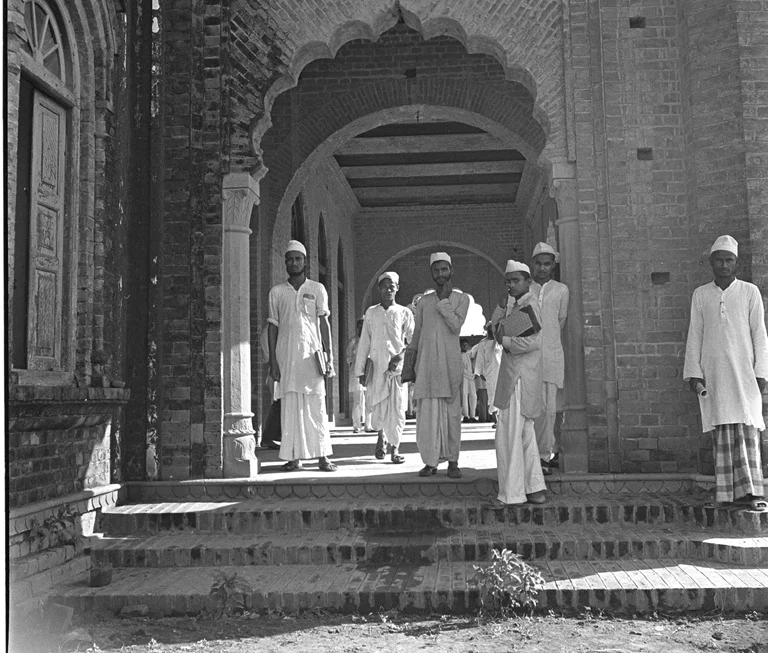Students coming out of the seminary after classes