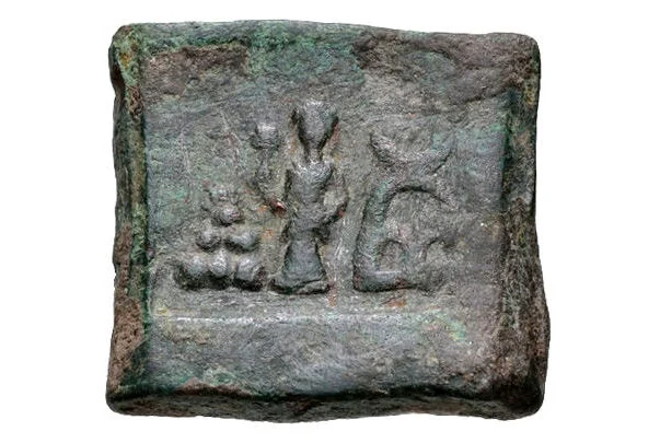 Taxila single-die coin with Lakshmi and arched-hill symbol (185–160 BCE) 