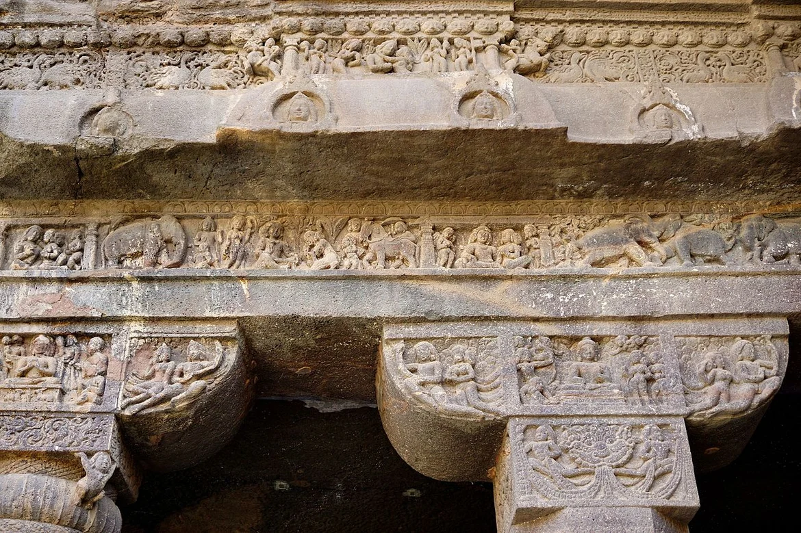 The frieze over Cave 1 front shows elephants, horses, bulls, lions, apsaras and meditating monks 