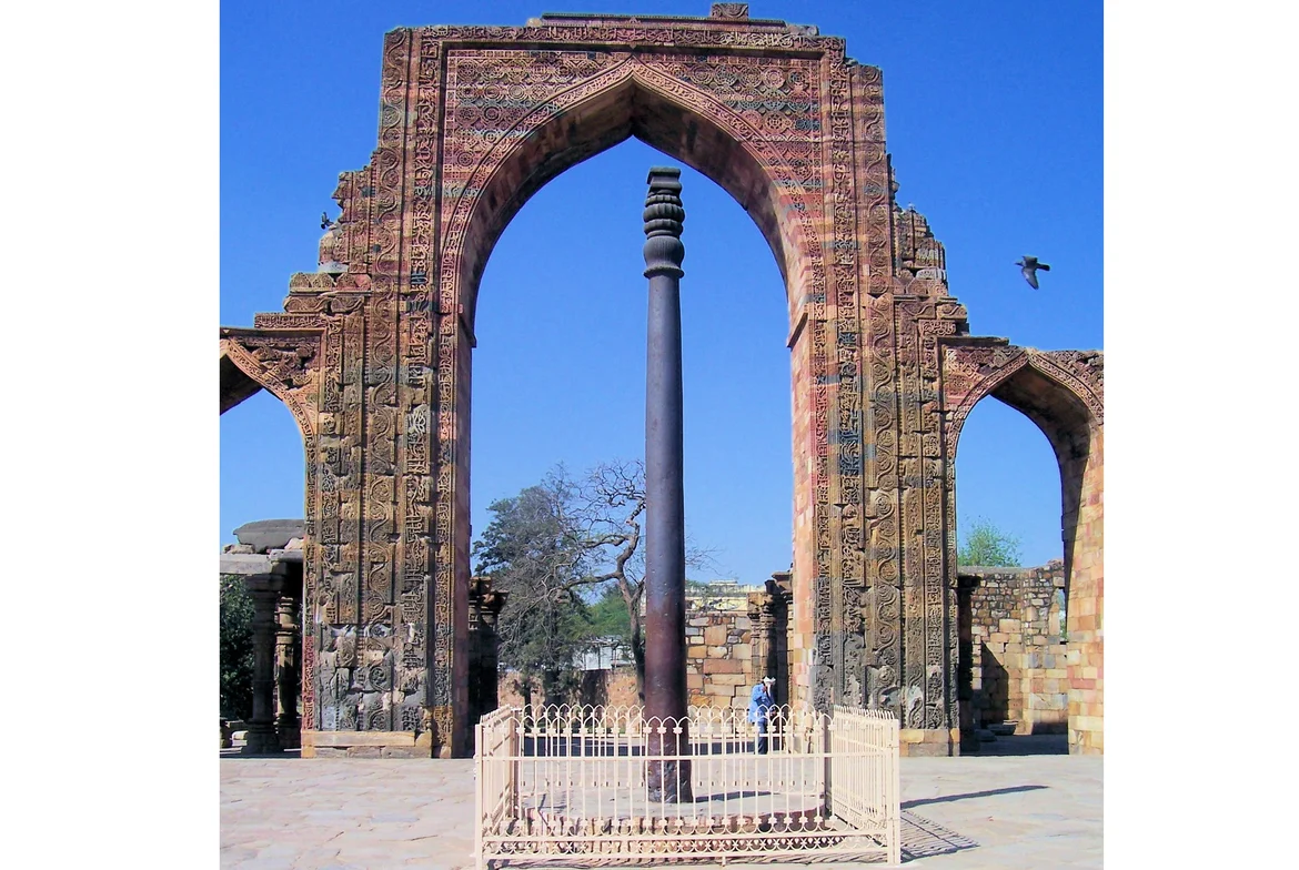 The Iron Pillar of Delhi in the Quwwat ul Islam Mosque 