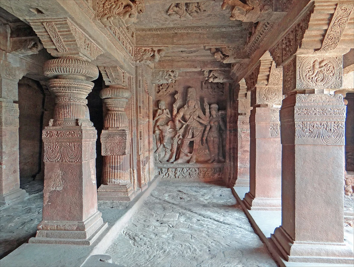 Shiva sculpture and engraved pillars in Cave 1