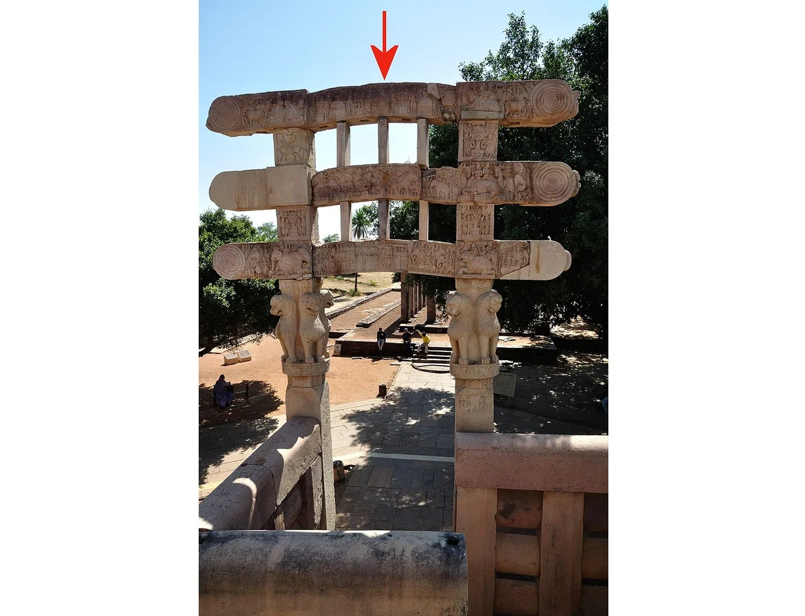 The southern gateway of the Sanchi stupa was, according to an inscription (see arrow), donated under the rule of ‘King Satakarni’