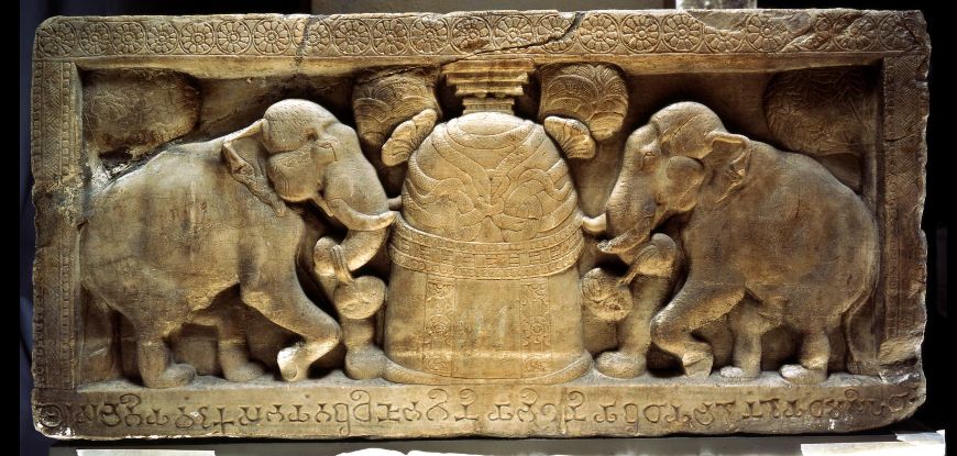 The Ramagrama Stupa covered in Nagas and being worshipped by Elephants, Amaravati
