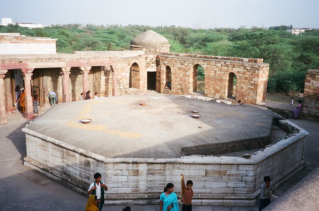The tomb lies under the octagonal roof