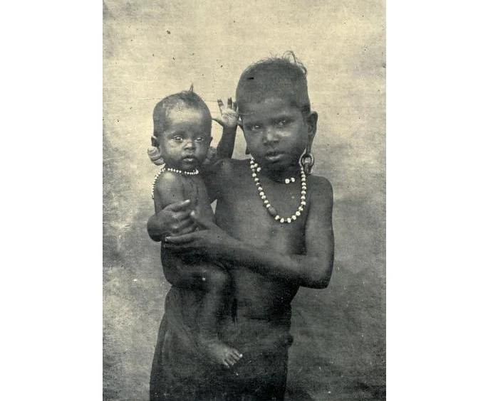 Kids belonging to the Kallar tribe, with dilated earlobes, formerly a common practice