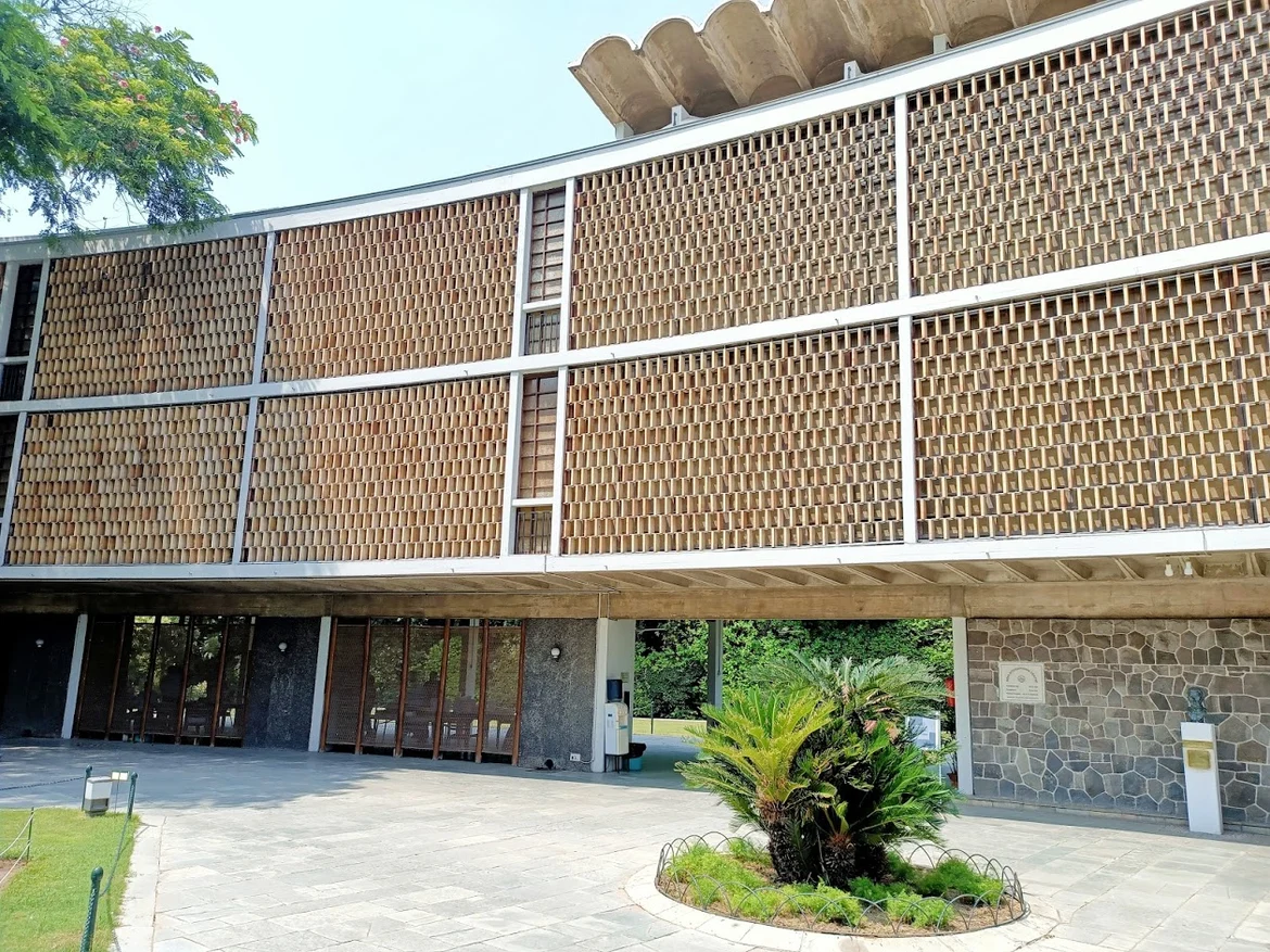 Courtyard façade with the <i>jaali </i>made of hand made clay bricks at India International Centre 