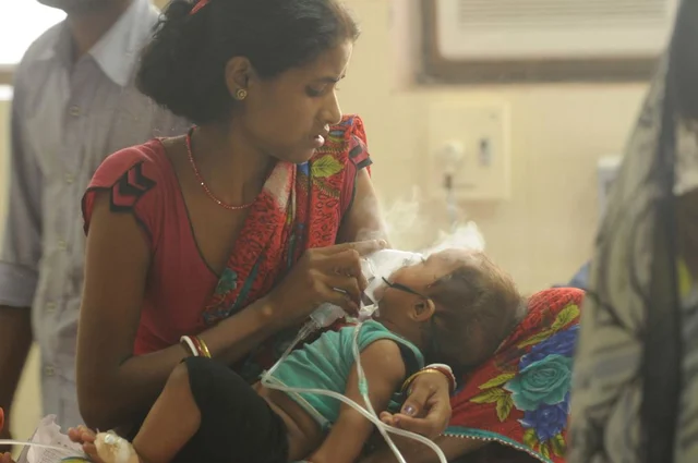 A child admitted inside encephalitis ward at BRD hospital in Gorakhpur. (Deepak Gupta/Hindustan Times via Getty Images) 