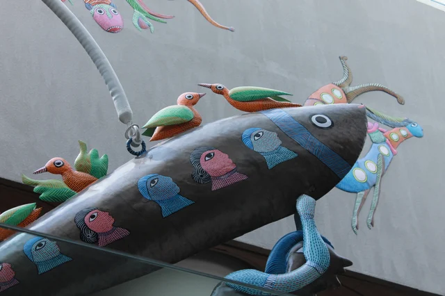 Movement and metaphors: A work of installation soars towards the skylight.