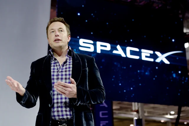 SpaceX chief executive officer Elon Musk unveils the company’s new manned spacecraft, The Dragon V2, designed to carry astronauts into space during a news conference in California. (Kevork Djansezian/GettyImages) 