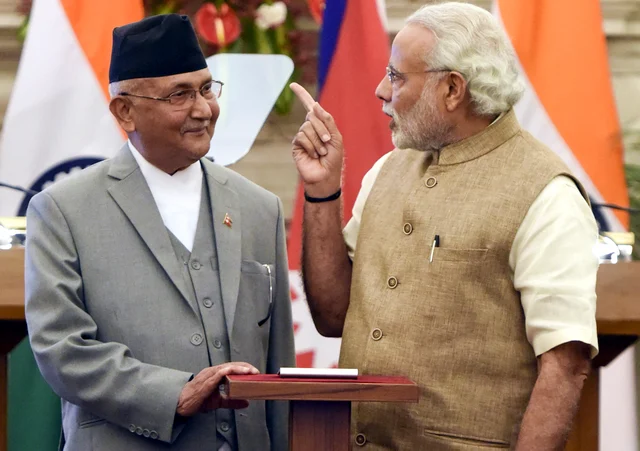 Prime Minister Narendra Modi with Nepal Prime Minister Khadga Prasad Sharma Oli. (Sonu Mehta/Hindustan Times via Getty Images)