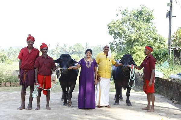 Alva and his wife with their ‘sons’ and their caretakers. 