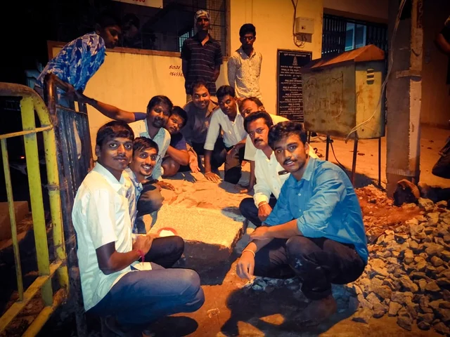Members of Revival Heritage Hub with the hero stone.