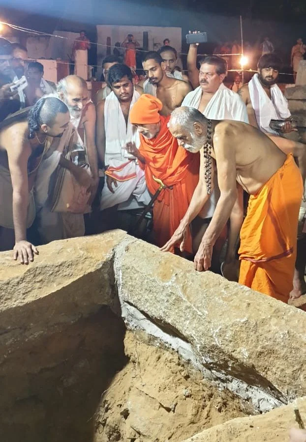 Seers of various Mathas seen inspecting the ruins and discussing the way forward. 