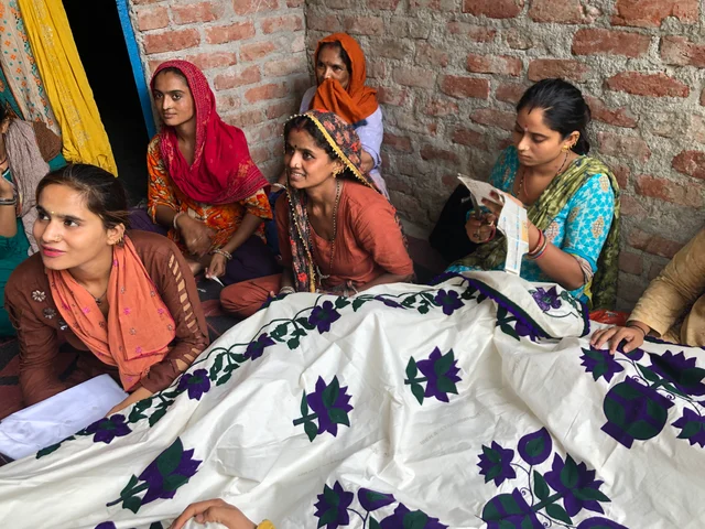 Women with their embroidery work.