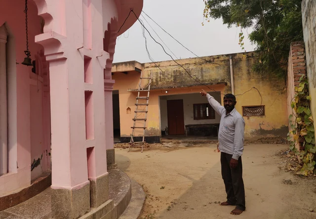 Shripal Singh points to the roof where he said Bunty stayed during the night before temple row. (Swati Goel Sharma)