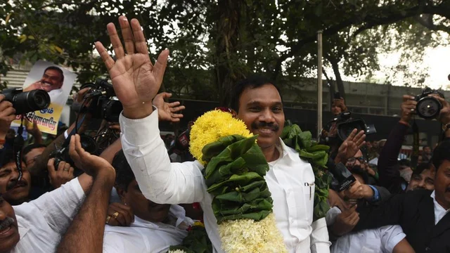 The telecom minister during UPA-2, A Raja, celebrates on being acquitted in the 2G spectrum case in 2017.