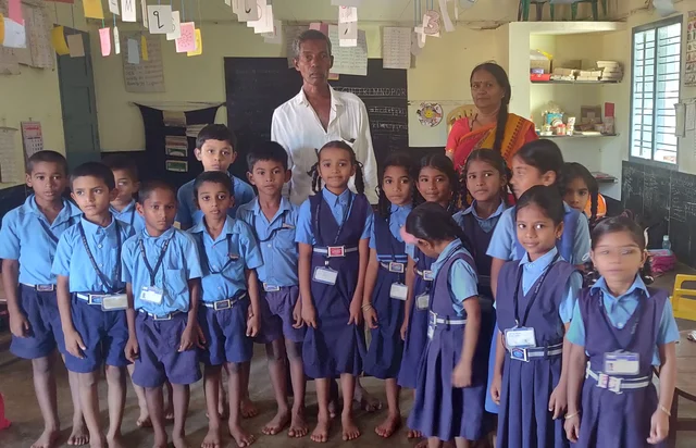Harekala Hajabba with students. 