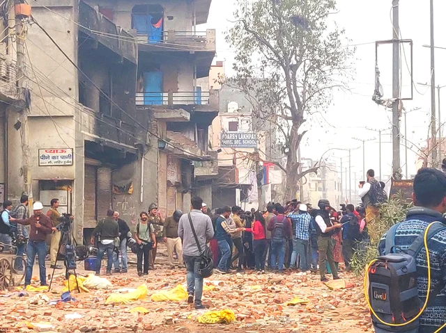 Mediapersons outside Hussain’s building on 27 February 