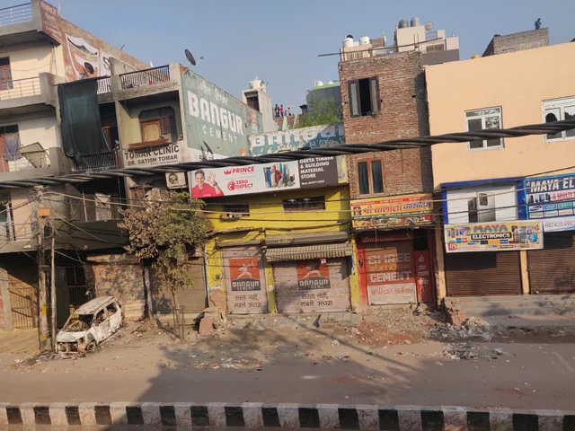 A stricture opposite Sushil Sharma’s house was burnt on the morning of 25 February