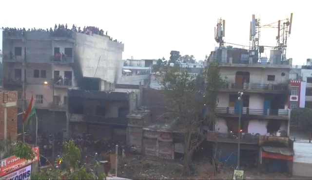 Still from the video on 25 February showing mob on Hussain’s building 