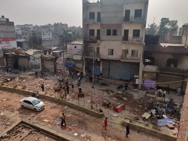 A view of the building of Tahir Hussain (tallest in the picture) from Moonga Nagar