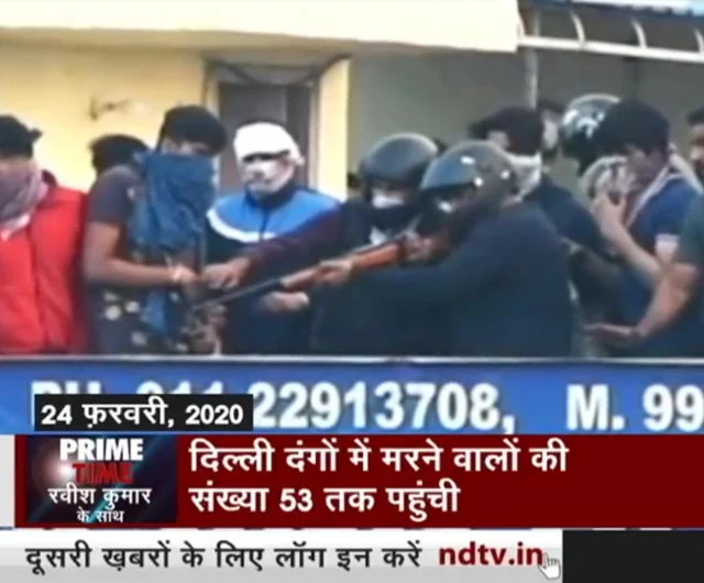 Hindu rioters on the roof of Mohan Nursing Home