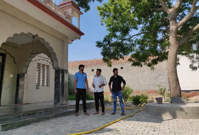 (Left to right) Ankit, Rajan and Vikas from Aasan Kalan village at the temple where they organised ‘ghar wapsi’ on 27 June