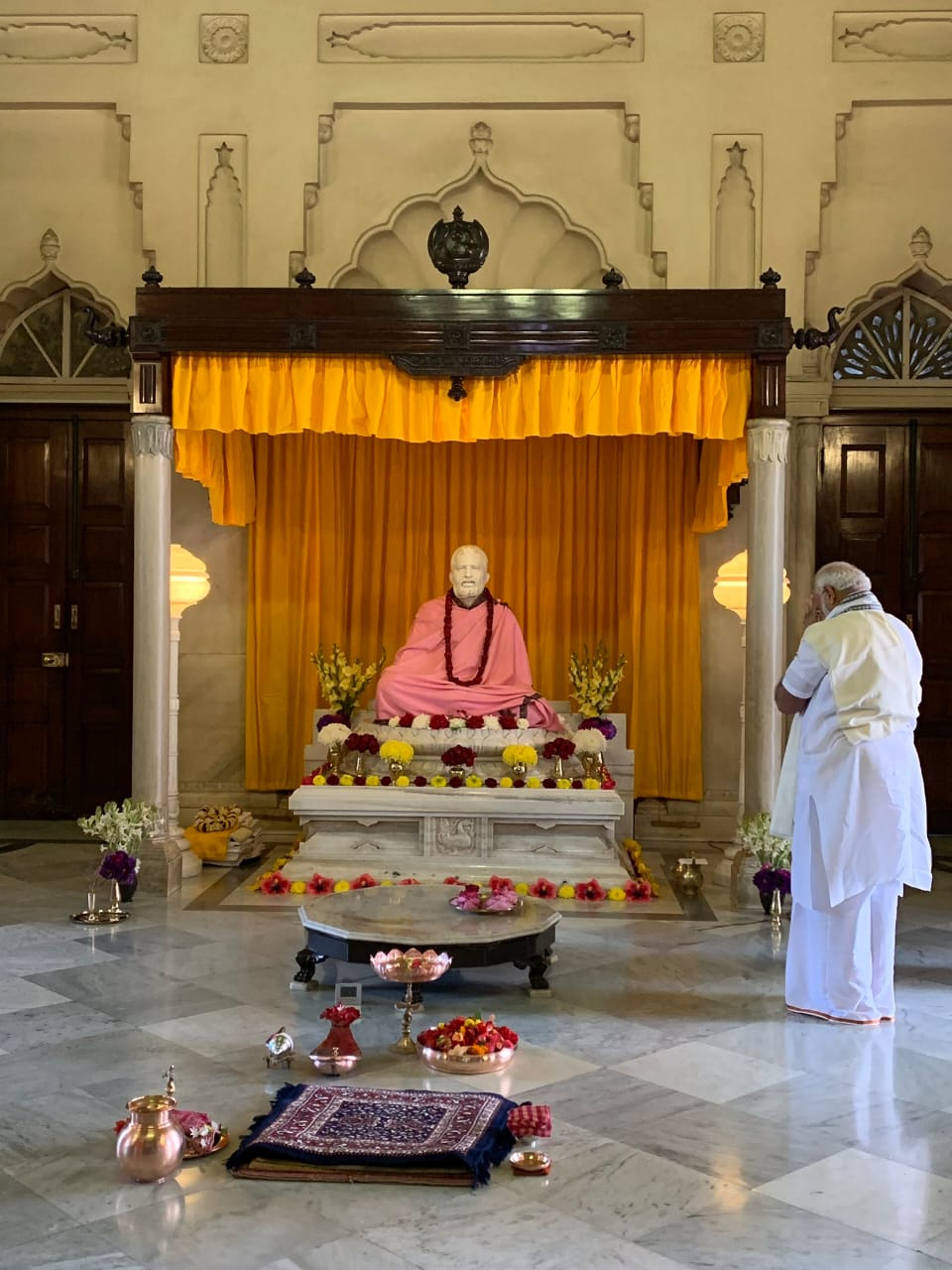 A silent prayer at the altar of Sri Ramakrishna. 
