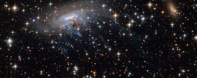 Spiral galaxy spills blood and guts
