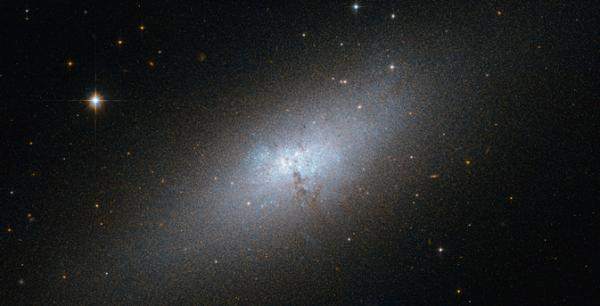 The peculiar compact Blue Dwarf Galaxy