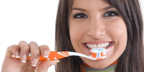 Woman Brushing Teeth