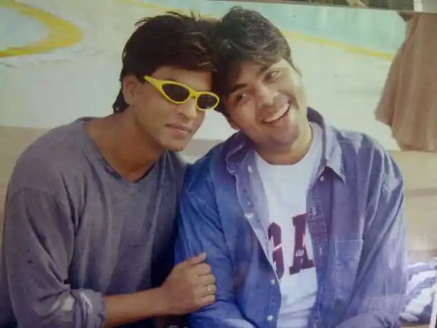 Shah Rukh and Karan Johar on sets of Kuch Kuch Hota Hai (Photo: <a href="https://twitter.com/karanjohar/media">Twitter/@karanjohar</a>)