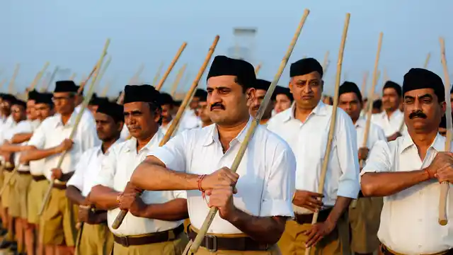 Volunteers of the Hindu nationalist organisation Rashtriya Swayamsevak Sangh (RSS) take part in a drill during their workers’ meet in Ahmedabad. 