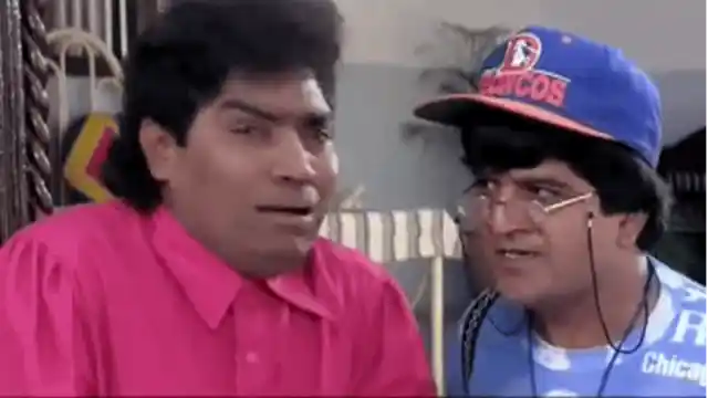 Johnny Lever as Kader Khan’s no-good son in <i>Judaai</i> (1997) (Source: <a href="https://www.youtube.com/watch?v=AF9DxyCXu-0">YouTube/rantigraj</a>)