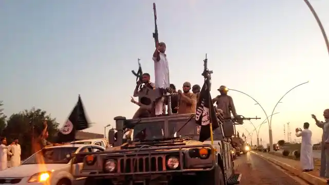 ISIS fighters in the northern city of Mosul, Iraq. (Photo: AP)