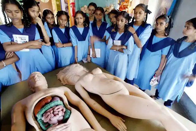 Archival picture of school girls looking at plastic models of a man and a woman at <i>Antarang</i> (inner view), India’s first ever sex museum, in Mumbai (Photo: Reuters)