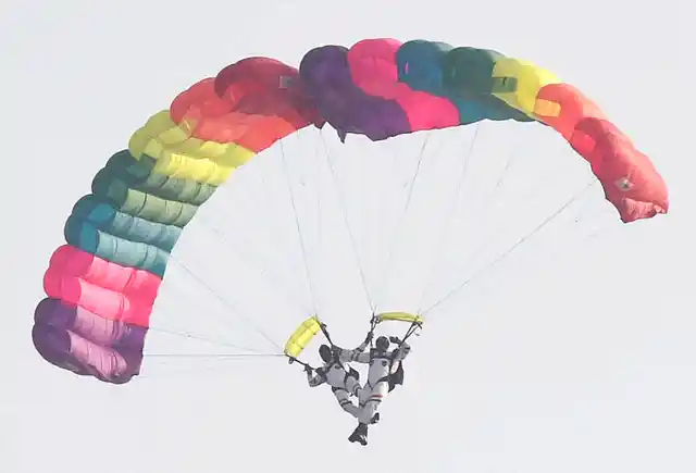Skydiving team of Akash Ganga in action during the Air Force Day Parade. (Photo: PTI)