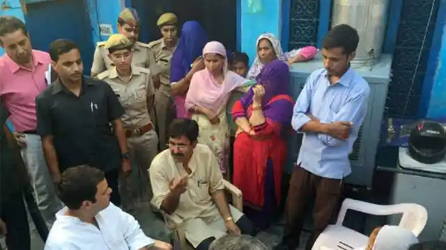 Congress Vice-President Rahul Gandhi meeting the family of Mohammad Akhlaq, who was lynched by a mob, at Bisara village in Dadri, October 3, 2015. (Photo: PTI)