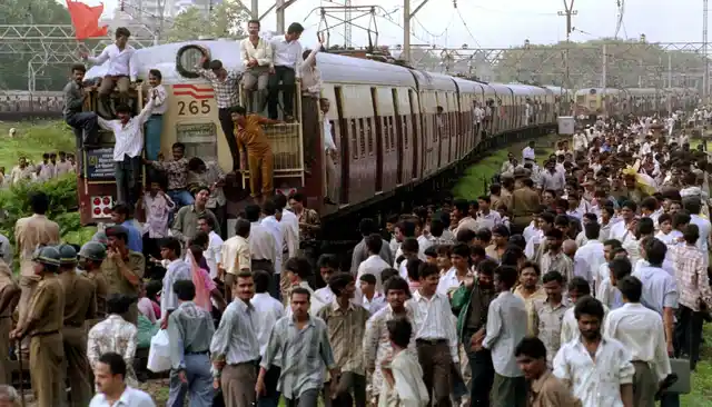 Shiv Sena party workers stopped suburban trains in Mumbai on July 10, 1997, to highlight their demand for apprentices who have been working with the Indian Railways since 1990 be given permanent jobs. (Photo: Reuters)