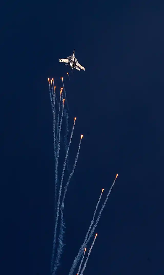 Indian Air Force Sukhoi Su-30 MKI fires flares during a Vertical Charlie manoeuvre at the Air Force Day parade at Hindon Air Force base. (Photo: AP)