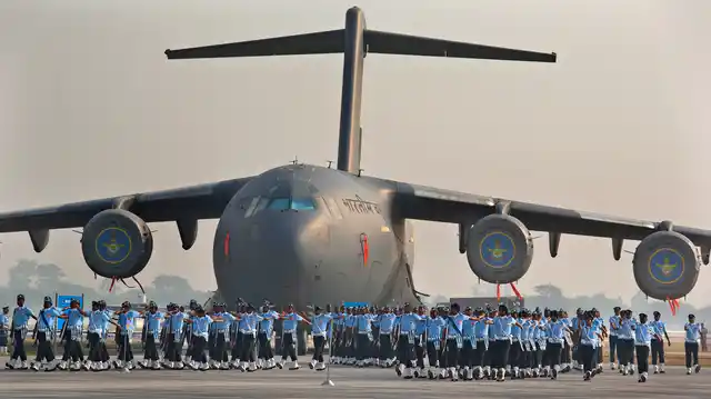 Indian Air Force soldiers march past the IAF C-17 Globemaster during the Air Force Day parade at Hindon Air Force base near New Delhi. (Photo: AP)