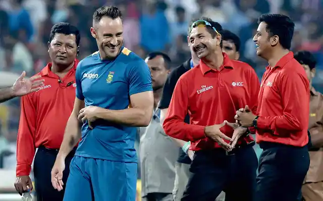South African captain Faf du Plessis shares a light moment with umpires during ground inspection for 3rd T20 Match at Eden Gardens. (Photo: PTI)